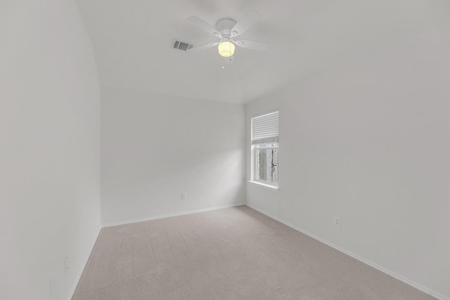 109 Inman Dr, Hutto, TX 78634 - empty room with light colored carpet and a ceiling fan