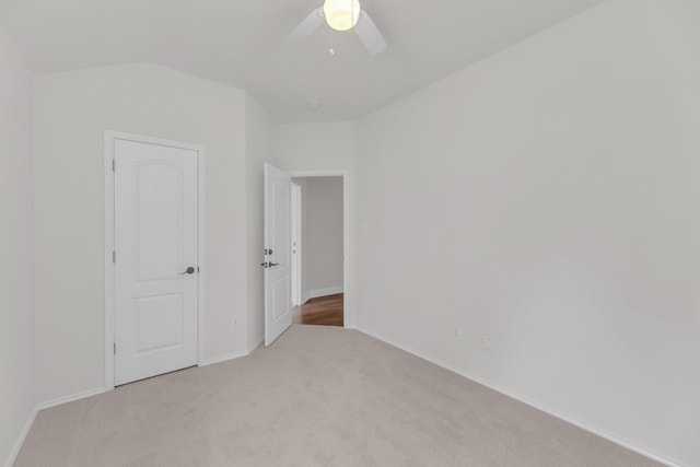 109 Inman Dr, Hutto, TX 78634 - unfurnished bedroom with light colored carpet and a ceiling fan