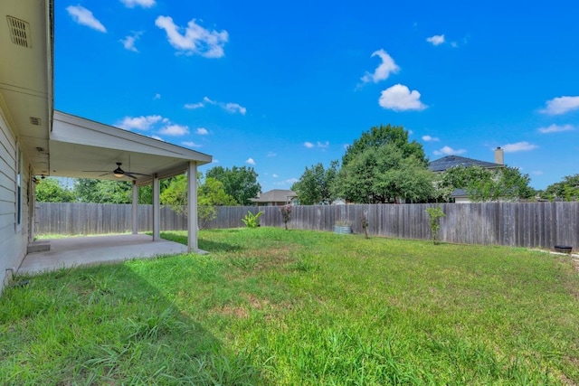 109 Inman Dr, Hutto, TX 78634 - fenced backyard featuring a ceiling fan and a patio area