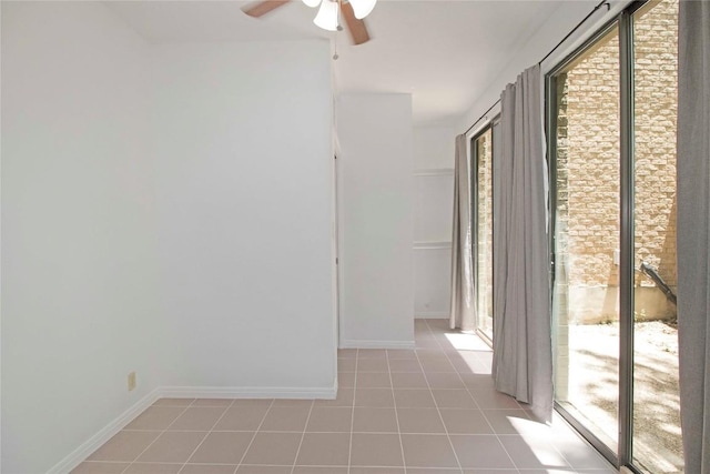 611 E 45th St Unit 8, Austin, TX 78751 - spare room featuring light tile patterned flooring and ceiling fan