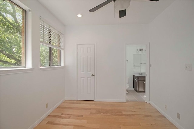 611 E 45th St Unit 8, Austin, TX 78751 - spare room with a ceiling fan, light wood-style flooring, and recessed lighting