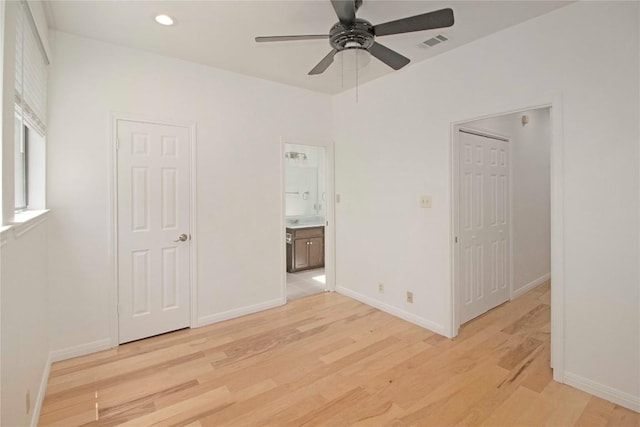 611 E 45th St Unit 8, Austin, TX 78751 - unfurnished bedroom with light wood finished floors, ensuite bathroom, recessed lighting, and a ceiling fan