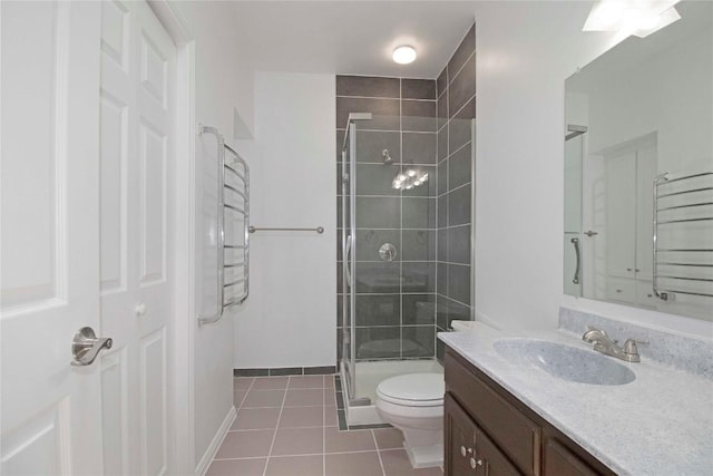 611 E 45th St Unit 8, Austin, TX 78751 - full bathroom with tile patterned floors, vanity, a shower stall, and a towel warmer