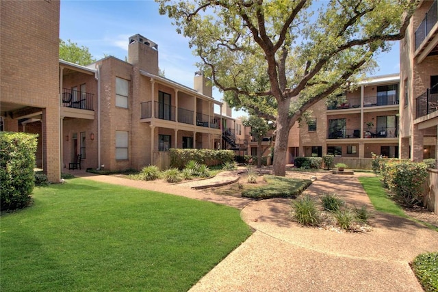 611 E 45th St Unit 8, Austin, TX 78751 - view of property's community with a yard