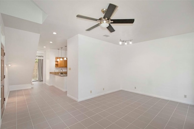 611 E 45th St Unit 8, Austin, TX 78751 - tiled spare room featuring a ceiling fan and recessed lighting