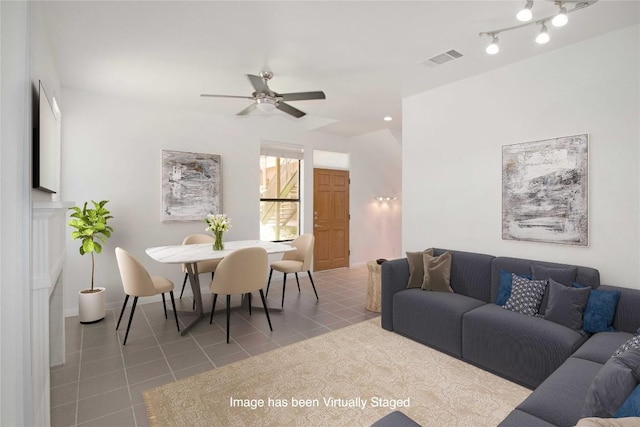 611 E 45th St Unit 8, Austin, TX 78751 - tiled living room with ceiling fan