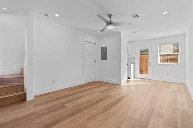 2706 Wheless Ln Unit 401, Austin, TX 78723 - unfurnished bedroom with electric panel, light wood-type flooring, recessed lighting, access to exterior, and ceiling fan
