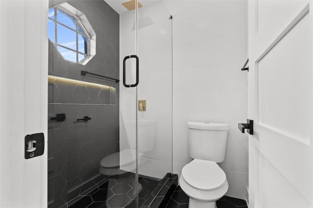 2706 Wheless Ln Unit 401, Austin, TX 78723 - full bath with tile walls, a shower stall, and tile patterned floors