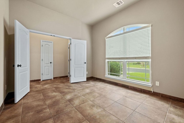 18712 Leigh Ln, Pflugerville, TX 78660 - unfurnished bedroom with tile patterned floors and baseboards