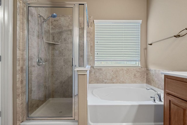 18712 Leigh Ln, Pflugerville, TX 78660 - full bath featuring a bath, a stall shower, and vanity
