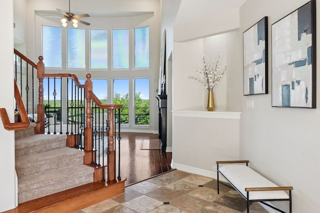 7204 Covered Bridge Dr, Austin, TX 78736 - entryway featuring stairway, a high ceiling, and a ceiling fan