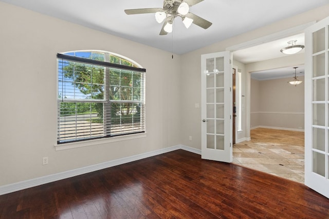 7204 Covered Bridge Dr, Austin, TX 78736 - unfurnished room with french doors, a ceiling fan, and wood-type flooring