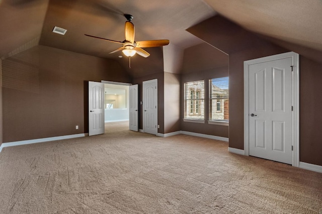 7204 Covered Bridge Dr, Austin, TX 78736 - unfurnished bedroom featuring vaulted ceiling, carpet, and a ceiling fan