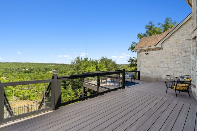 7204 Covered Bridge Dr, Austin, TX 78736 - wooden terrace featuring a view of trees