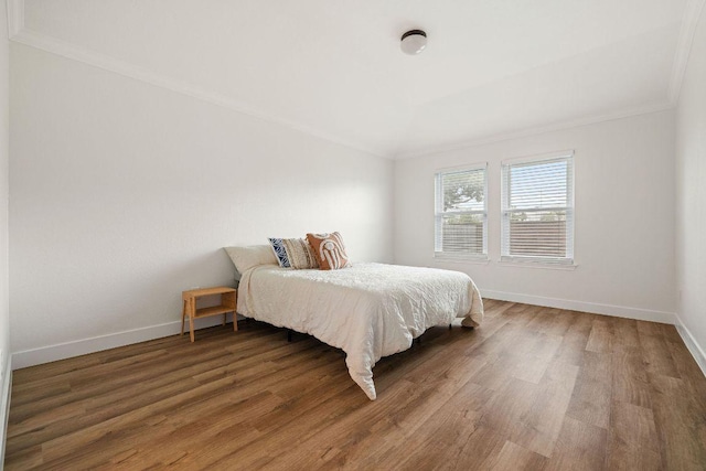 608 Timothy John Dr, Pflugerville, TX 78660 - bedroom featuring ornamental molding and wood finished floors