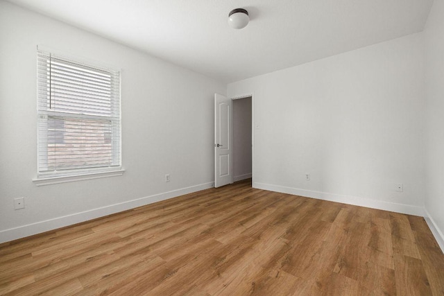 608 Timothy John Dr, Pflugerville, TX 78660 - empty room with light wood finished floors and baseboards