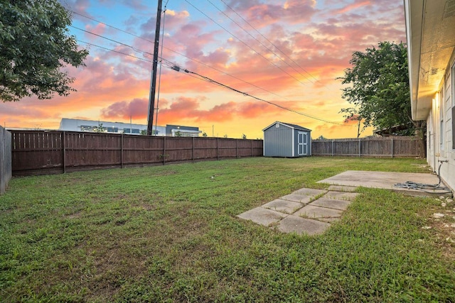 608 Timothy John Dr, Pflugerville, TX 78660 - fenced backyard featuring a patio area and a storage shed