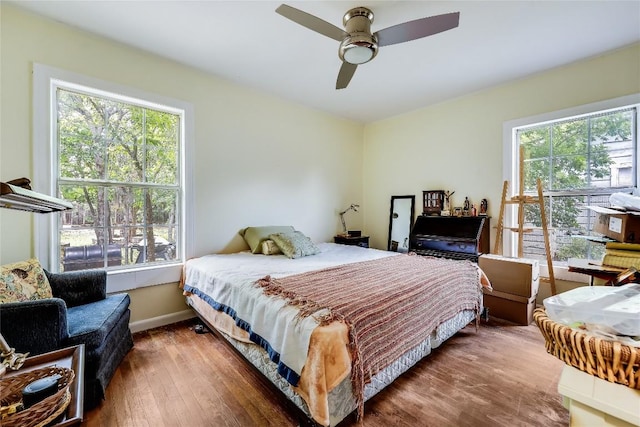 1506 Alguno Rd, Austin, TX 78757 - bedroom featuring hardwood / wood-style flooring and a ceiling fan