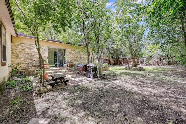 1506 Alguno Rd, Austin, TX 78757 - fenced backyard featuring a patio area