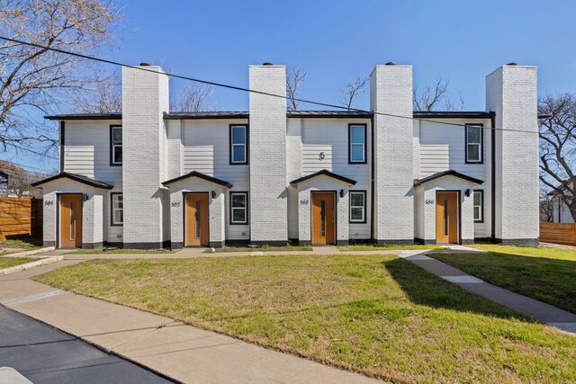 2706 Wheless Ln Bldg 5, Austin, TX 78723 - view of front of house featuring a chimney