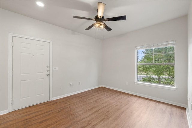 2320 Gracy Farms Ln Unit 323, Austin, TX 78758 - unfurnished room featuring wood finished floors, ceiling fan, and recessed lighting
