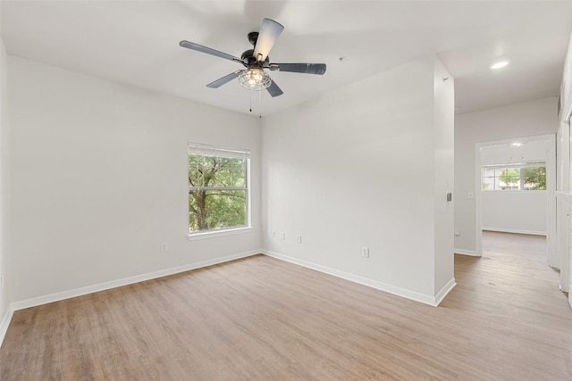 2320 Gracy Farms Ln Unit 323, Austin, TX 78758 - spare room with light wood finished floors, ceiling fan, and recessed lighting