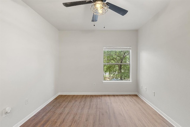 2320 Gracy Farms Ln Unit 323, Austin, TX 78758 - spare room featuring wood finished floors and ceiling fan