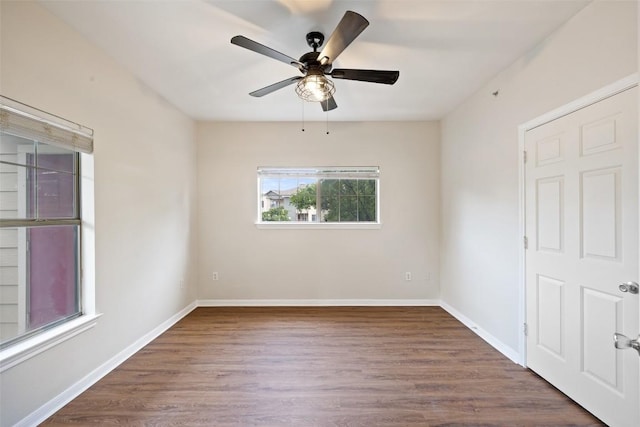 2320 Gracy Farms Ln Unit 323, Austin, TX 78758 - empty room featuring wood finished floors and a ceiling fan
