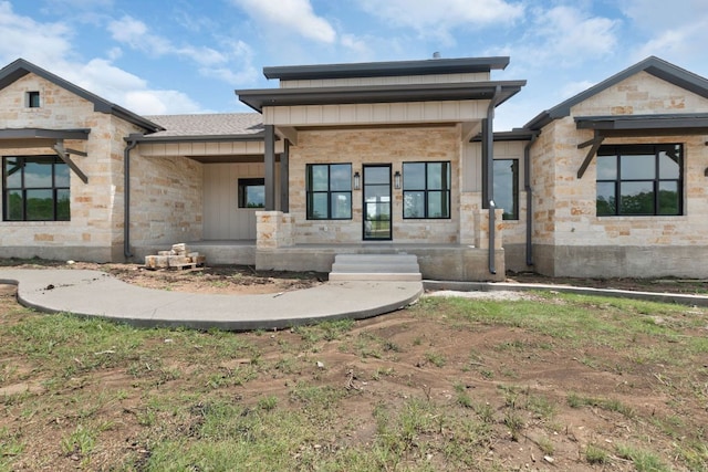 209 Burnet Oaks Dr, Burnet, TX 78611 - view of front of home with stone siding and covered porch