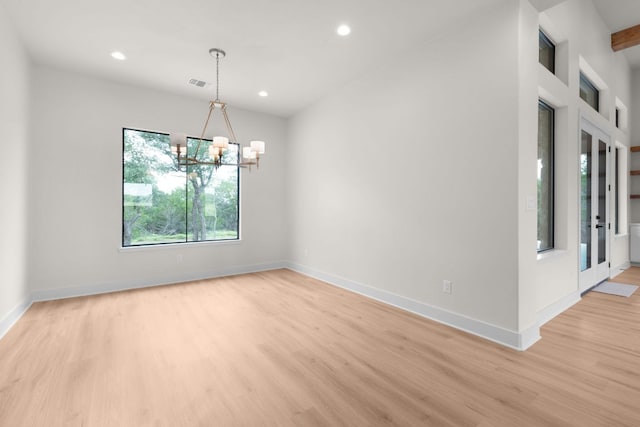 209 Burnet Oaks Dr, Burnet, TX 78611 - spare room featuring light wood finished floors, a chandelier, and recessed lighting