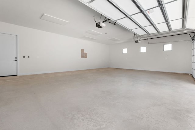 209 Burnet Oaks Dr, Burnet, TX 78611 - garage with a garage door opener and electric panel