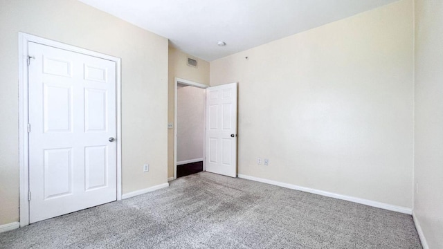 2320 Gracy Farms Ln Unit 1432, Austin, TX 78758 - unfurnished bedroom featuring carpet