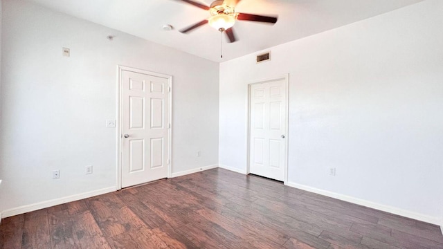 2320 Gracy Farms Ln Unit 1432, Austin, TX 78758 - unfurnished bedroom with wood finished floors and a ceiling fan