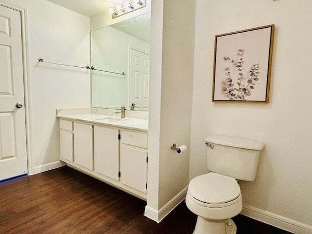 2320 Gracy Farms Ln Unit 1432, Austin, TX 78758 - bathroom with vanity and wood finished floors