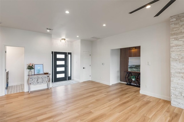 18924 Peckham Dr, Point Venture, TX 78645 - foyer featuring light wood finished floors and recessed lighting