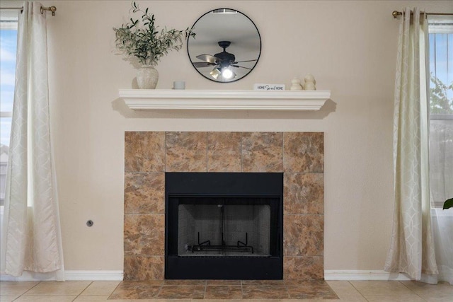 327 Lakemont Dr, Hutto, TX 78634 - detailed view of a ceiling fan and a tiled fireplace