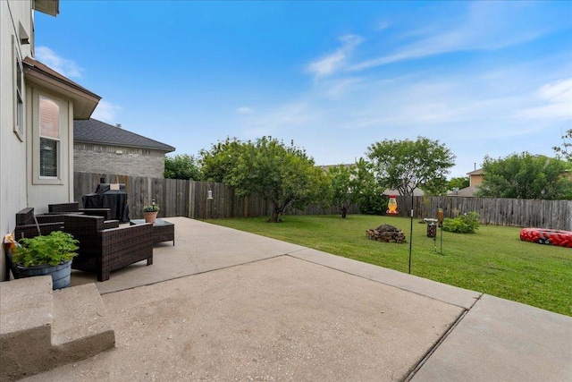 327 Lakemont Dr, Hutto, TX 78634 - fenced backyard featuring a patio and outdoor lounge area