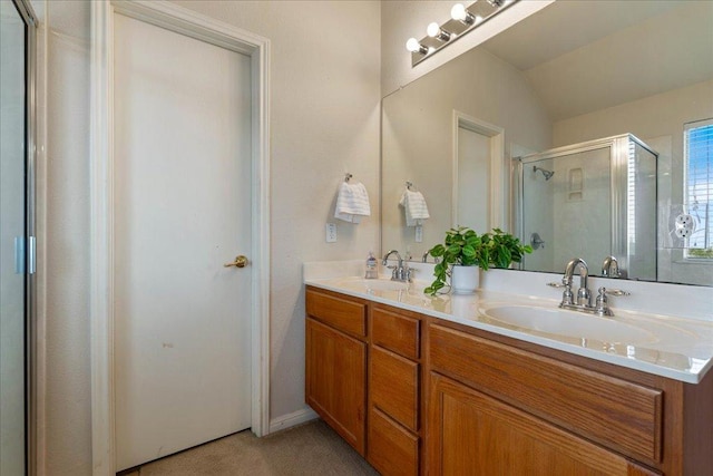327 Lakemont Dr, Hutto, TX 78634 - full bath featuring a shower stall and double vanity