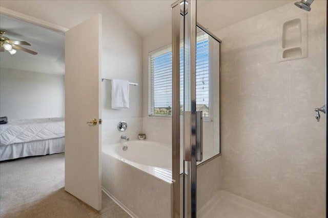 327 Lakemont Dr, Hutto, TX 78634 - full bath featuring connected bathroom, a bath, a stall shower, a ceiling fan, and vaulted ceiling