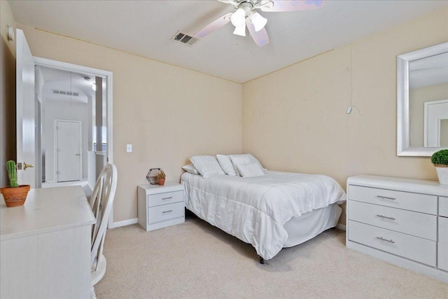 327 Lakemont Dr, Hutto, TX 78634 - bedroom featuring light colored carpet and a ceiling fan