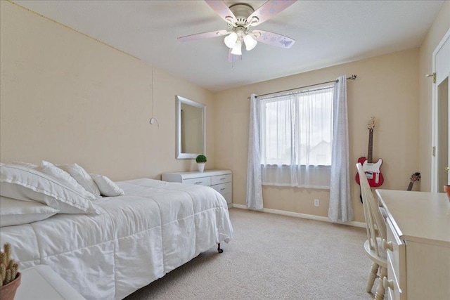 327 Lakemont Dr, Hutto, TX 78634 - bedroom with light colored carpet and a ceiling fan