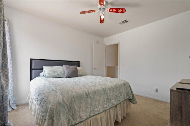 327 Lakemont Dr, Hutto, TX 78634 - bedroom with light carpet and ceiling fan