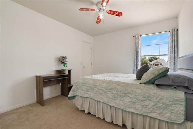 327 Lakemont Dr, Hutto, TX 78634 - bedroom featuring light colored carpet and ceiling fan