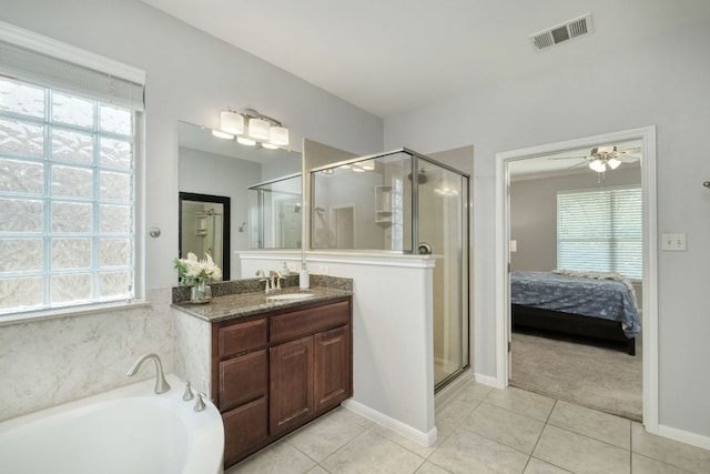 12421 Black Hills Dr, Austin, TX 78748 - ensuite bathroom featuring a shower stall, vanity, and healthy amount of natural light
