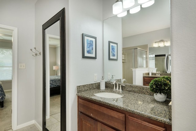 12421 Black Hills Dr, Austin, TX 78748 - full bathroom with ensuite bath, a shower stall, vanity, and tile patterned floors