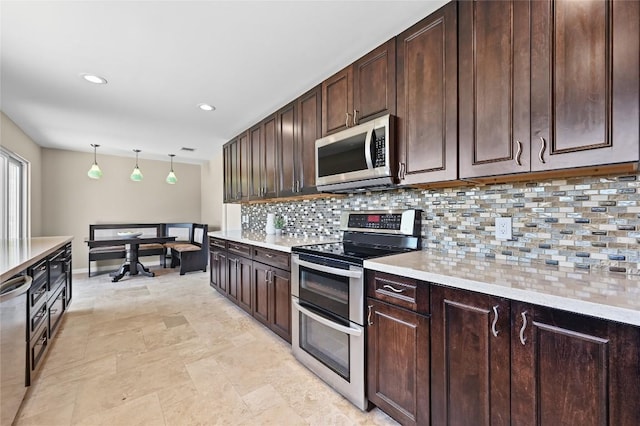 2512 Regal Park Ln, Austin, TX 78748 - kitchen featuring appliances with stainless steel finishes, dark brown cabinetry, tasteful backsplash, light countertops, and recessed lighting