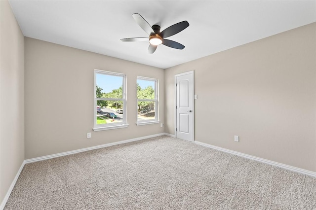 2512 Regal Park Ln, Austin, TX 78748 - carpeted spare room featuring a ceiling fan and baseboards