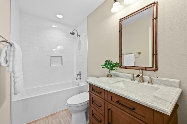 2512 Regal Park Ln, Austin, TX 78748 - bathroom with vanity, bathing tub / shower combination, and wood finished floors