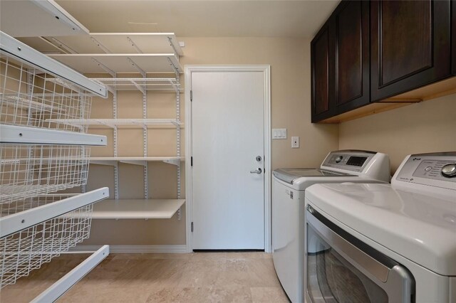 2512 Regal Park Ln, Austin, TX 78748 - washroom featuring cabinet space and separate washer and dryer