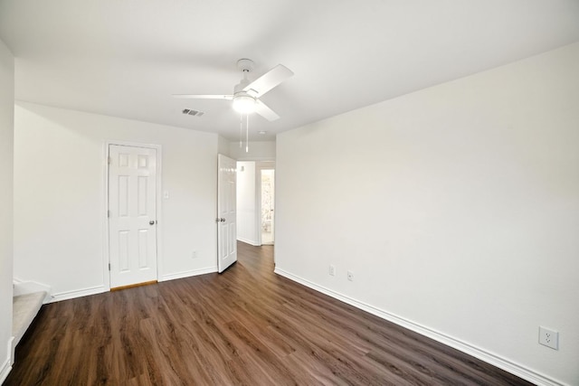 3801 Poppy Hills Cv, Round Rock, TX 78664 - unfurnished bedroom featuring dark wood-style floors and ceiling fan